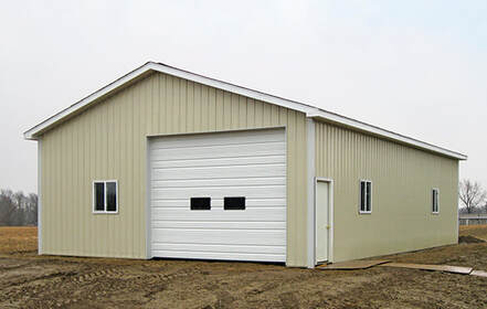 1 garage door and 1 service door pole barn approximate size 30'x48'x12' with a 16'x10' garage door