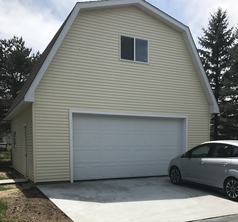 Step #4 of building a pole barn, put on the siding, trim and all of the finishing touches. 
