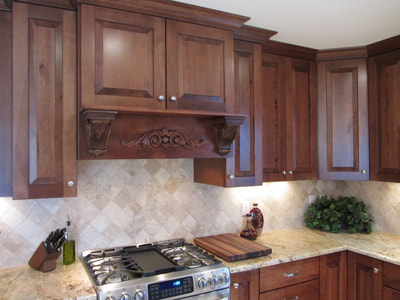 Kraftmaid cabinetry in Durango door style with beautiful Chestnut stain. 
