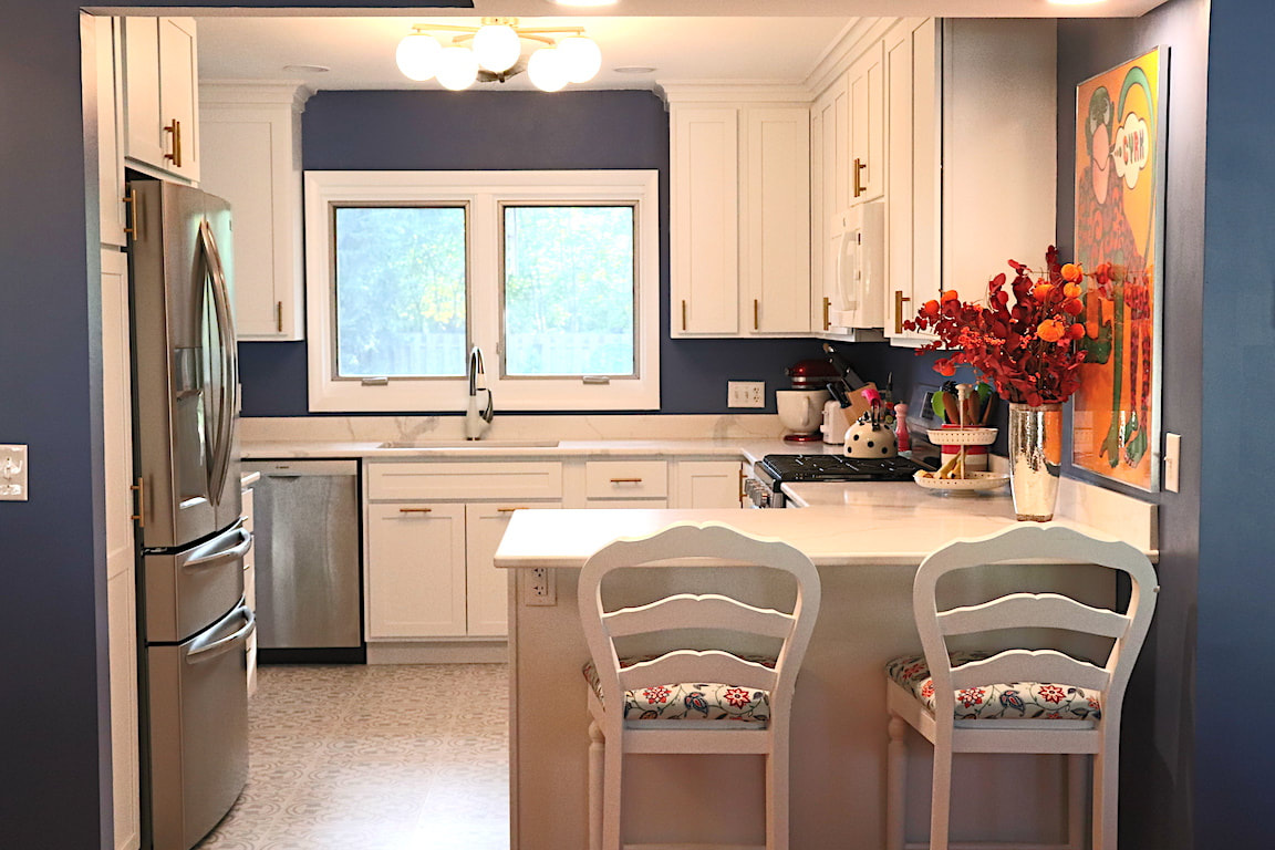 Gallery #21 - kitchen remodel featuring Kraftmaid Vantage white shaker cabinetry