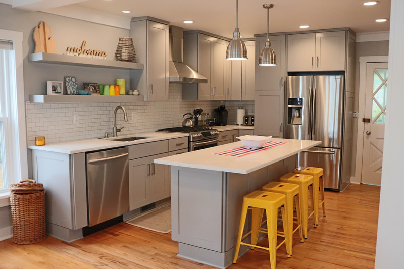 Gallery #23 - lake house kitchen remodel featuring Kraftmaid Vantage cabinetry in a medium gray paint shaker cabinet.