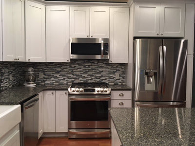 Gallery #18 - Kraftmaid Vantage semi-custom white shaker cabinetry kitchen
