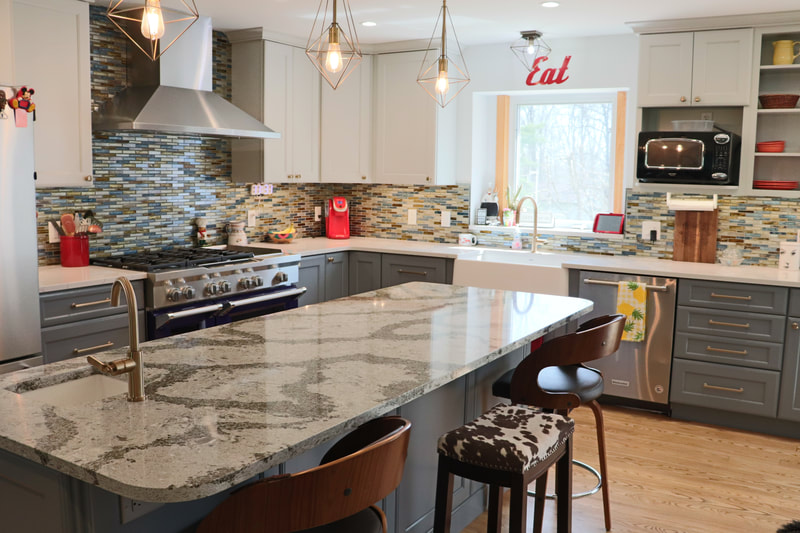 Gallery #22 - Kraftmaid Vantage 2 toned white and gray kitchen with large center island. 